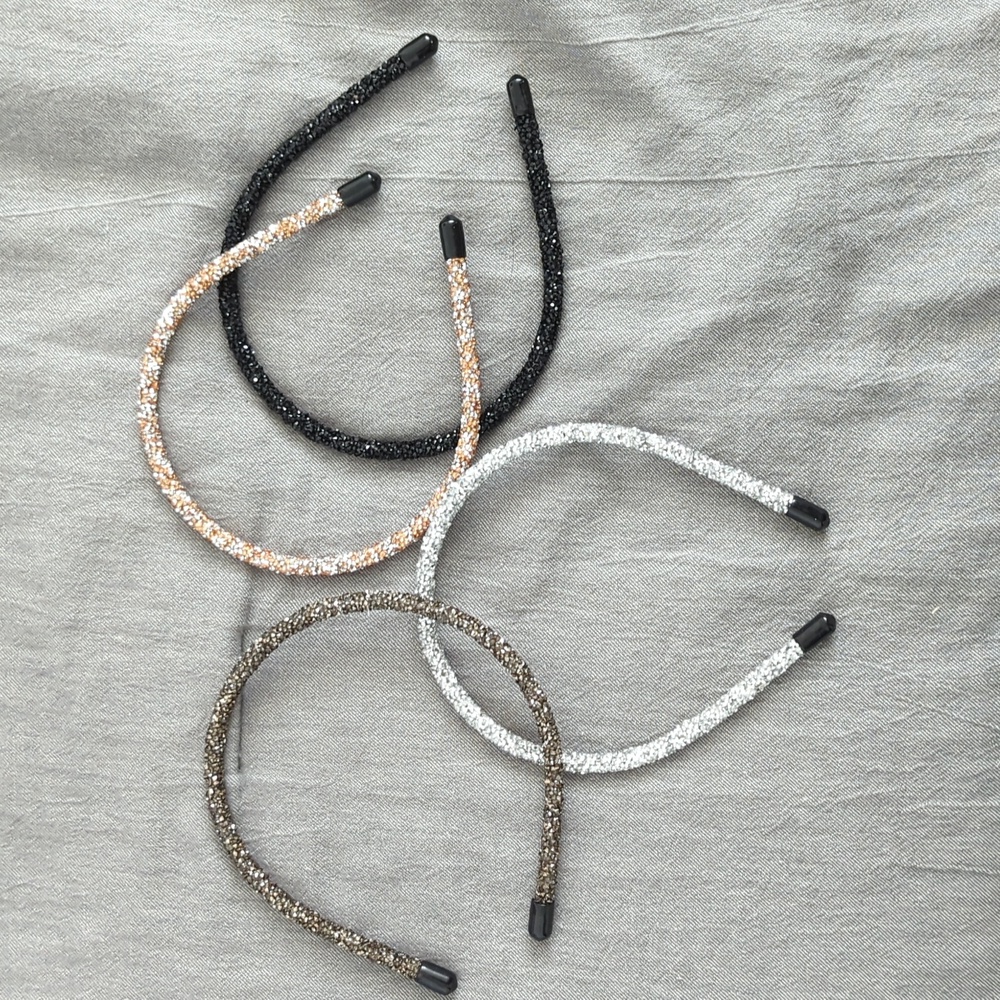 Four Anthropologie glittery headband